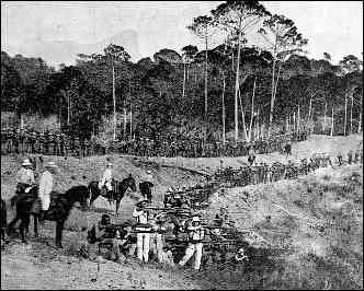 Spanish troops take aim